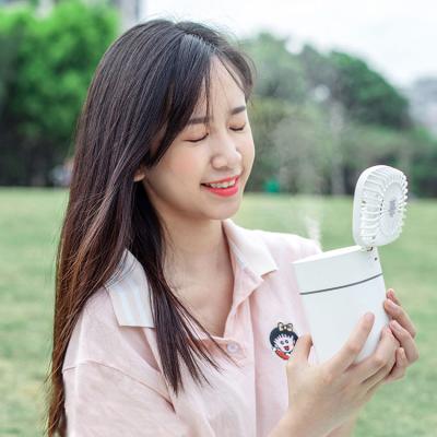 China Portable Humidification Spray Fan Water Spray Fan Mini Handheld Mini Fan Wholesale Mini Cooling Fan for sale