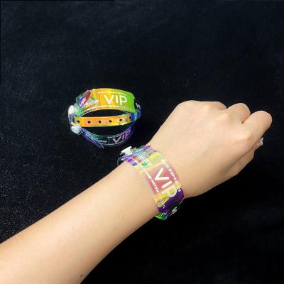 China Supplier Wholesale Waterproof Shiny Wristband Custom Logo Promotional Gift Event Glitter Transparent Laser PVC Wristband for sale