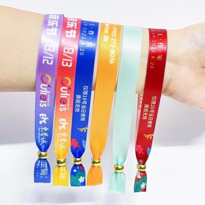 China Hot Selling Custom Logo Polyester Woven Cloth Wristbands Gift For Promotion And Events Adjustable Length Woven Wristband for sale