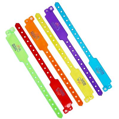 China Manufacturer Disposable Custom Wristband Neon Fluorescent Color Plastic Vinyl PVC Waterproof Event Party Gift Wristband for sale