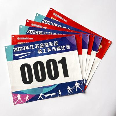 China Custom Competition Player Identification Bib Numbers For Kids And Adults Tyvek Paper Race Biking Marathon Number Bibs for sale