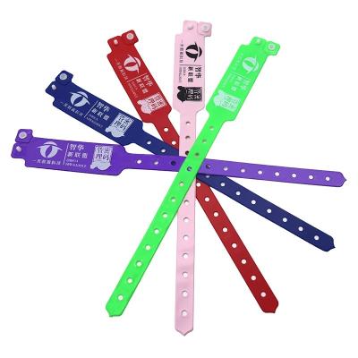 China Manufacturer Customizable Solid Color Wristband Plastic Vinyl Event Wristbands With Barcode for sale