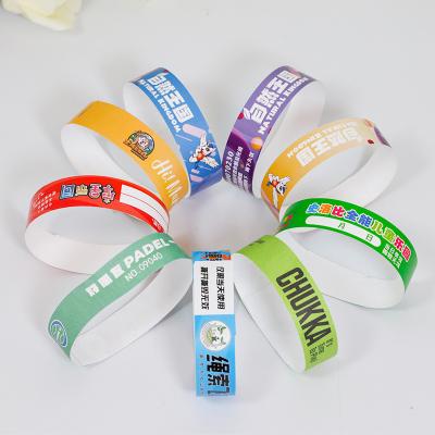 China Custom Event PP Synthetic Paper Wristband Party Park Logo Printed Waterproof Sweat Resistant Entry Admission Wrist Bands for sale