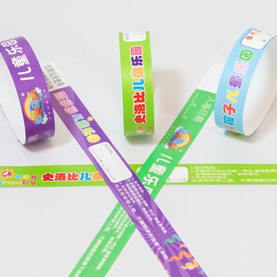 China Custom Event PP Synthetic Paper Wristband Party Park Pool Logo Printed Waterproof Entry Admission Wrist Bands for sale