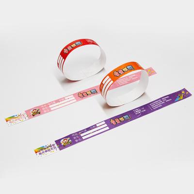 China Event PP Synthetic Paper Custom Wristband Logo Printed Water/Sweat Resistant Party Park Entry Admission Wrist Bands for sale