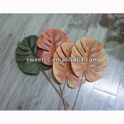 China Beautiful colorful wholesale artificial turtle leaf simulation leaf wedding back leaves collectively for sale