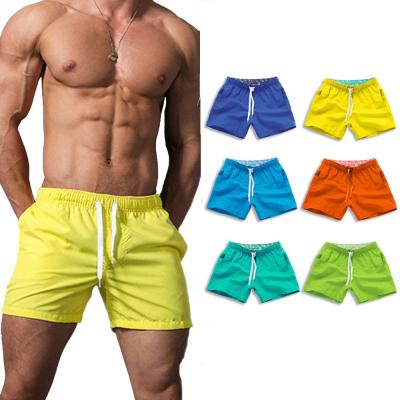 China Custom Made QUICK DRY Summer Board Shorts Simple Beach Shorts Mens Waterproof Empty Swim Trunks For Men for sale