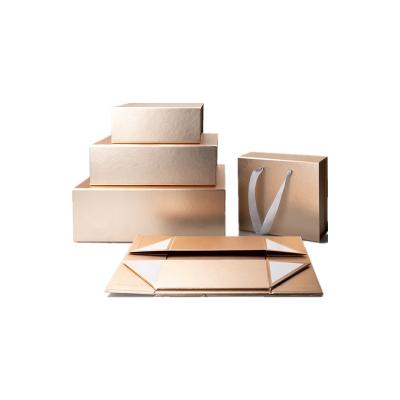 China Recyclable Attractive Collapsible Cloth Storage Folding Hat Packaging Box Gold Foil Folding Rigid Box With Rope Handle for sale