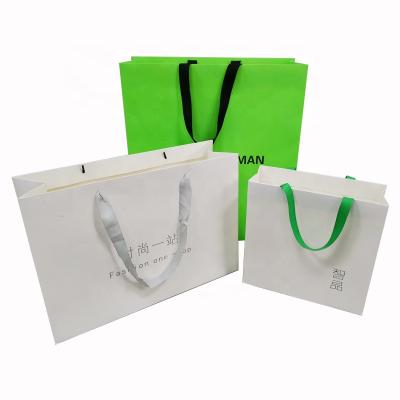 China Recyclable Cheap Price Clothes Packing Gift Paper Shopping Bag Manufacturer Custom Paper Bags for sale