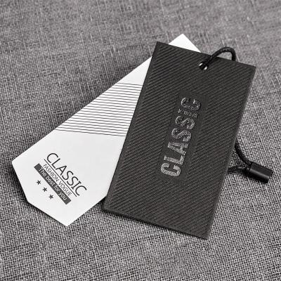 China Recyled Recycled Embossed Paper Hang Tags Custom Logo Hot Stamping Black Cardboard Gift Tag for sale