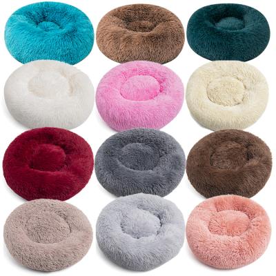 China Long Plush Pet Stocked Fluffy Bed For Cat Puppy Donut Soothing Bed Anti Slip Dot Bottom Around Cat Bed for sale