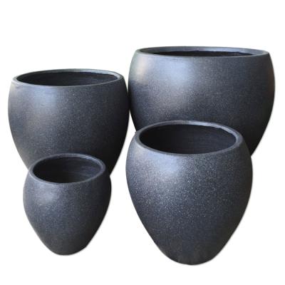 China Modern Modern Style Round Fiberstone Ceramic Flower Pot Planter For Home Decor for sale