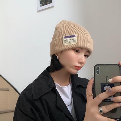 China Fashion JOINT label colorful patch sewing deep knit beanie for adult with soft and warm handfeel for winter season for sale