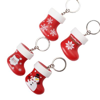 China Newest Next Christmas Sock Shape Plastic LED Snowman Santa Claus Snowflake Pattern Sound Key Chain Key Chain For Xmas Gifts for sale