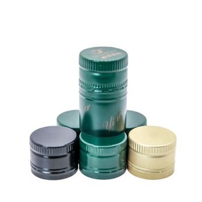 China 31*52mm pilfer-proof roll on pilfer proof aluminum-plastic olive oil capsule with pourer for sale