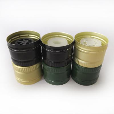 China 31.5*23/24 mm Olive Oil Cap Pilfer Proof Aluminum Plastic Lid With Plastic Pourer for sale