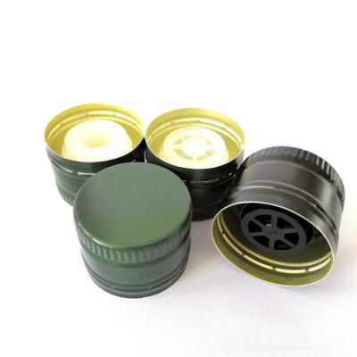 China Pilfer proof aluminum covers 31.5*23/24mm lid closure with plastic pourer for olive oil for sale