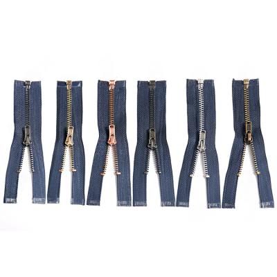 China Viable Wholesale 3# 5# Jeans Copper Tooth Zipper Open End Garment Denim Pants Metal Zipper Custom for sale