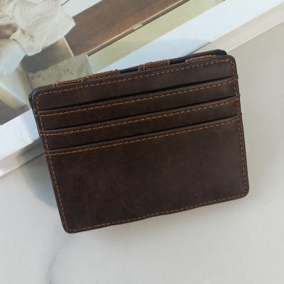 China Anti-theft Wallet OEM Vintage Genuine Leather Short Magic Wallets Cowhide Purse Coin Pocket Male Multifunctional Card Holder QB1008-3 for sale