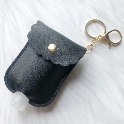 China Fashionable New Hot Sell Intelligent Car Bottle Key Ring Bag Pendant Portable Travel Key Size Bottles With Leather Holder Key Chain YSK013 for sale