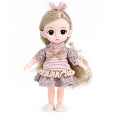 China Mini Toy Dolls East Asian 6 Inch Big Eyes Lovely Faces Baby Doll Nice Girls Gift With Handbag For Kids for sale