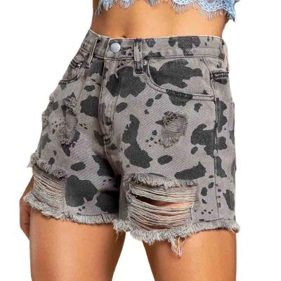 China New summer fashion casual women's breathable cow print washed high waist straight denim ripped short pants for sale