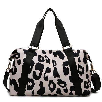 China New Style Large-capacity Anti-theft Cow Printing High Quality Waterproof Wet-Dry Separation Exercise Luggage Bag for sale