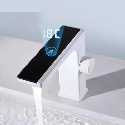 China Metered Smart Lavatory Digital Display White Basin Faucet All-Copper Faucets Hot And Cold Faucet for sale