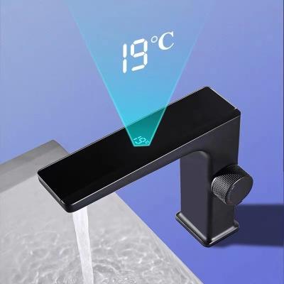 China Metered Faucets Black Light Luxury Fashion Digital Display Basin Faucet Toilet Sink Hot And Cold Faucet for sale