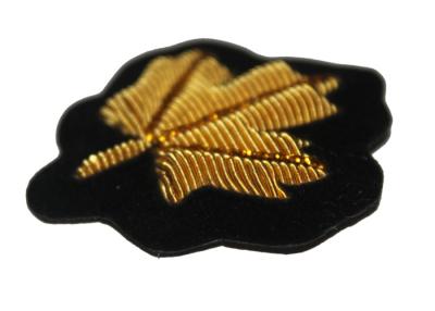 China Gold Maple Leaf Embroidered Flower Patches Embroidered School Badges for sale