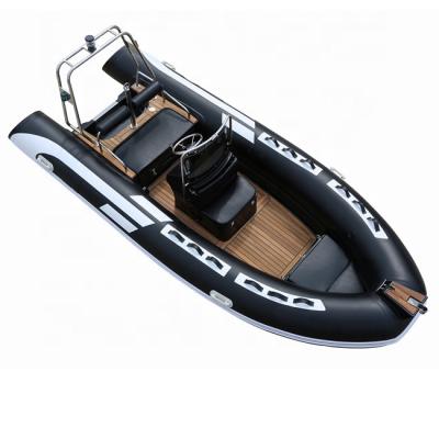 China Fiberglass CE 480 RIB Inflatable Fiberglass Fishing Rowing Boat With Outboard Motor for sale