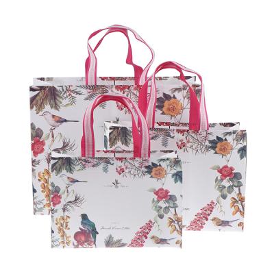 China Dreamlike Flowers Handled Nonwoven Fabric Box Bag Foldable Shopping Bag for sale