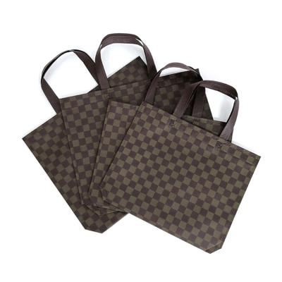 China Custom Classic Lattice Design Processed Handled Nonwoven Sack Shopping Bag for sale