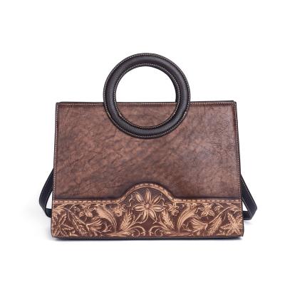 China Vintage OEM Chinese Style Women Bag Large Capacity Embossed Handbag Top Layer Whip Retro One Shoulder Messenger Bag for sale