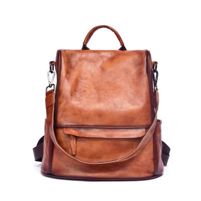 China OEM Vintage Style Backpack Women Girl Cowhide Leather Casual Handbag Men Retro European Large Capacity Unisex Anti Theft for sale