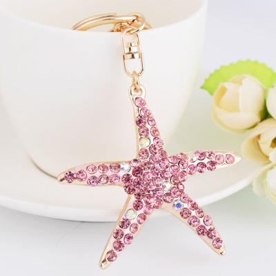 China Pretty YN Fashion Starfish Keychain Glitter Crystal Rhinestones Purse Pendant Handbag Key Chain Charm for sale