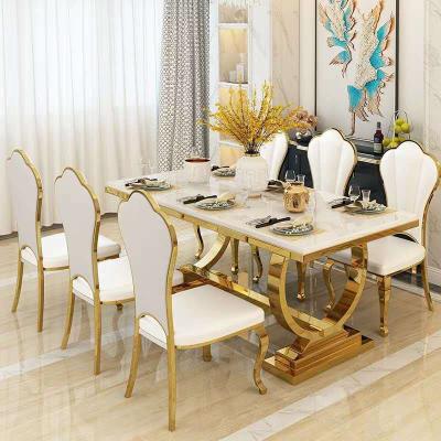 China Best Selling Convertible Modern Elegant Marble Titanium Stainless Steel Chair King Dining Table Dining Sets for sale