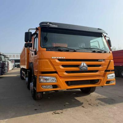 China 8x4 Diesel gebruikte dump truck tipper nieuwe motor transmissie banden Howo 460 pk Te koop