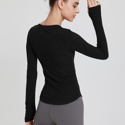 China Breathable Women's Sports Blouse Women's Quick Dry Slim Quick-Dry Fitness Clothes Autumn Winter Running Long-Sleeved Yoga Top for sale