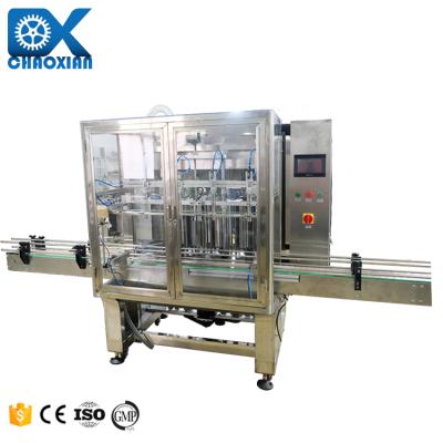 China Automatic Liquid Bottle Plastic Tube 5Gallon Water Hot Juice Rotary Oil Filling Machine Te koop