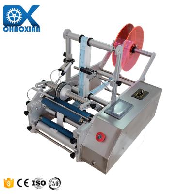 China Semi Auto Sauce Round Bottle Product Roller Sticker Labeling Machine Scratch Card PVC Self Adhesive for sale