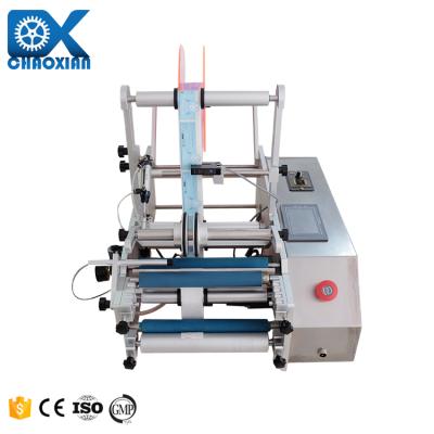 China Desktop Semi Automatic Rotary Paper Tube Labeling Machine Pill Pharmaceutical Pet Bottle Sticker Labeling Machine for sale