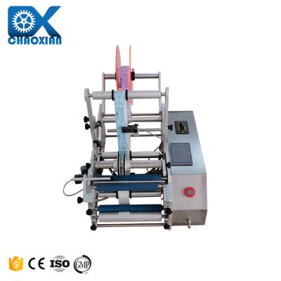 Китай Semi Automatic 2 Side Adhesive Sticker Bottle Labeling Machine Aerosol Can Alcohol 50Ml 30Ml 10Ml продается