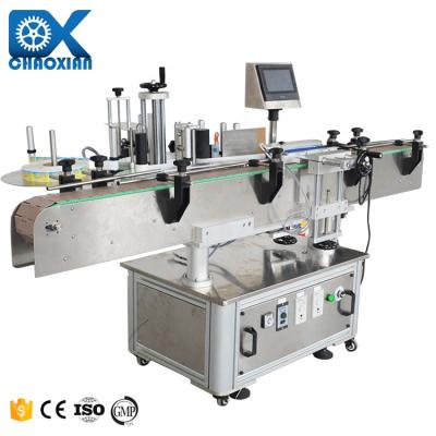 China Rectangular Roll to Roll Wine PVC Sticker Label Micro Dispensing Rolling Labeling Machine 16 Colors en venta