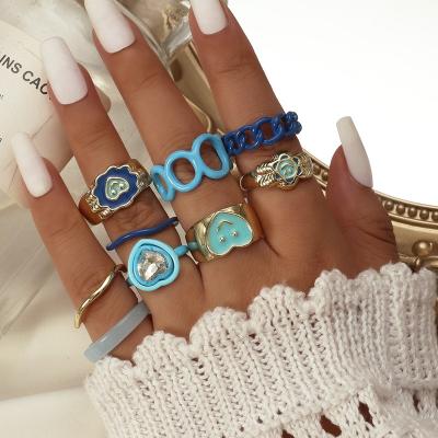 China Resin Casual Cool Blue Ring Non Fading Geometric Niche Ring Love Smile Alloy Index Finger Ring Set for sale