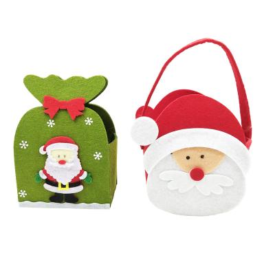 China Fashionable 3D Christmas Santa Candy Bag Christmas Gift Non-woven Mini Handbag Christmas Backpack for sale