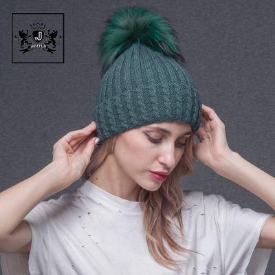 China COMMON Women Raccoon Fur Ball Winter Hat Detachable Wool Knitted Beanie Hats for sale