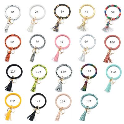 China Wholesale Leather Tassel Leather Bracelet Clasp Key Leopard Simplicity Monogram Key Chain for sale