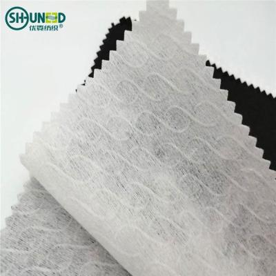 China Eco - Friendly Embossed Nonwoven Fabric Sustainable Tencel Polyester Spunlace Rolls For Wet Tissue for sale