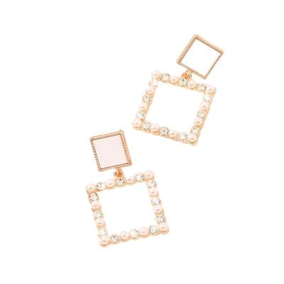 China Nickel-Free Lead-Free DL1A33 New square studded white earrings temperament high cold female earrings fashion silver needle earrings. for sale